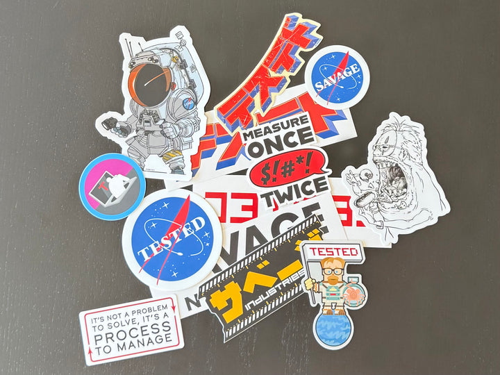 Stickers from the Stick Happens Mega Sticker Pack on a dark surface #mobile